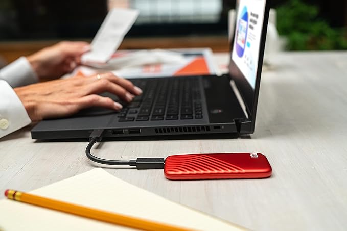 WD 1TB My Passport SSD Portable External Solid State Drive, Red, Sturdy and Blazing Fast, Password Protection with Hardware Encryption - WDBAGF0010BRD-WESN